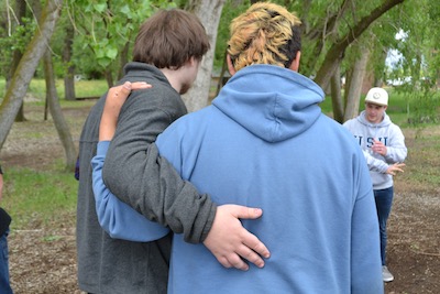 boys walking on campus