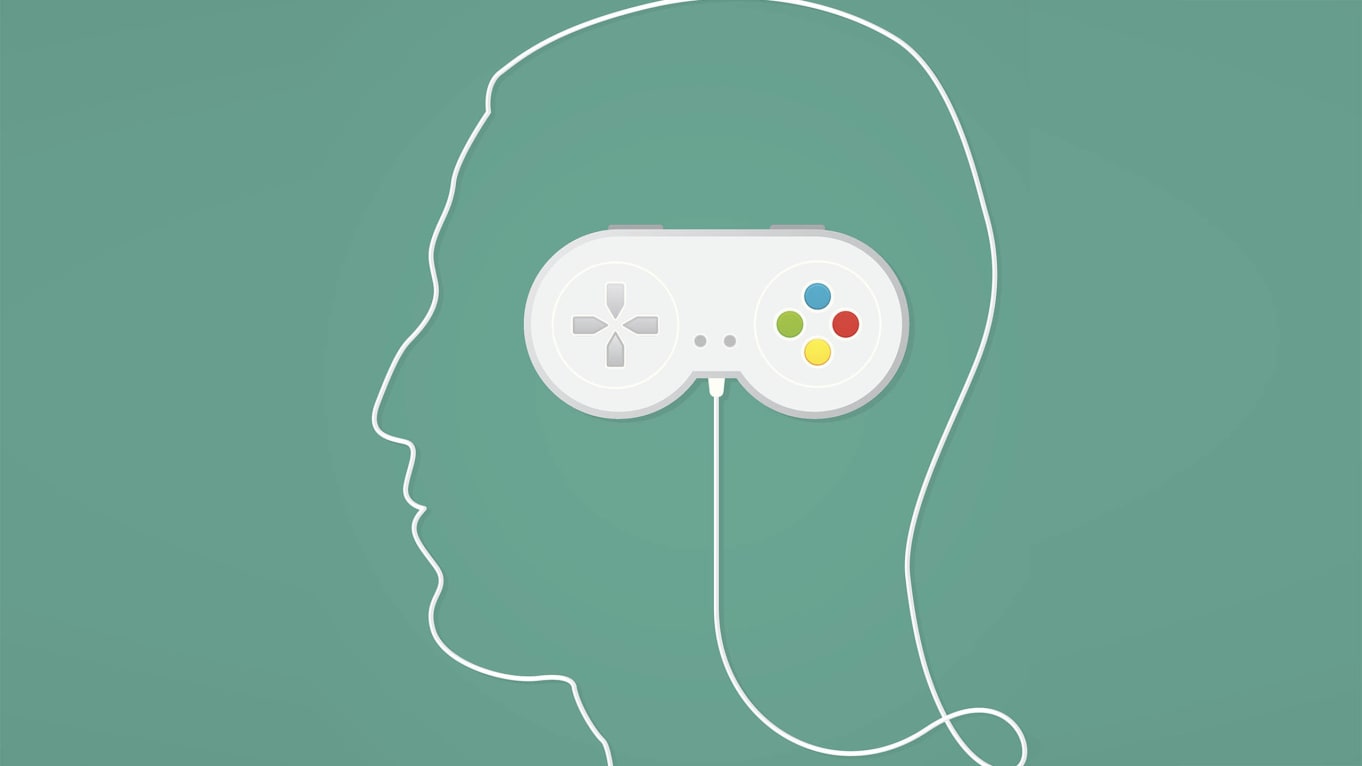 head profile with video game controller for brain