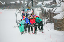 Group of teens on ski lift
