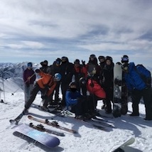 Group skiing and snowboarding