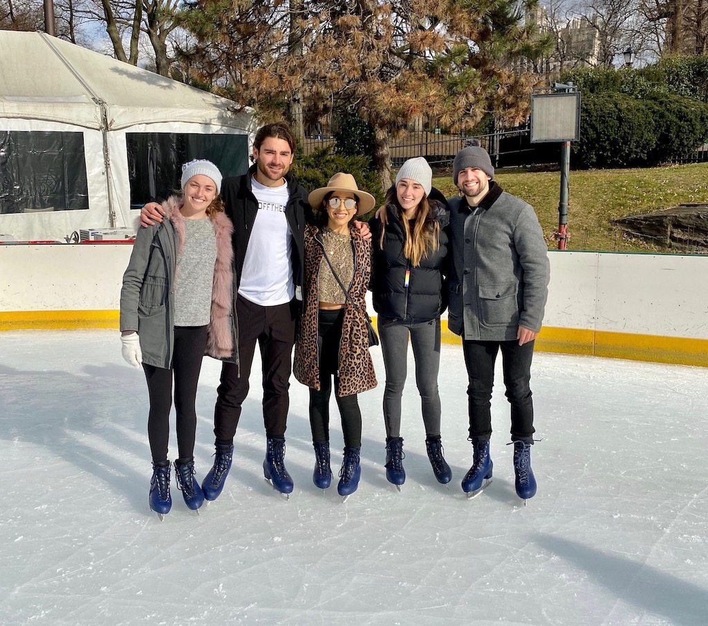 Group of adults ice skating