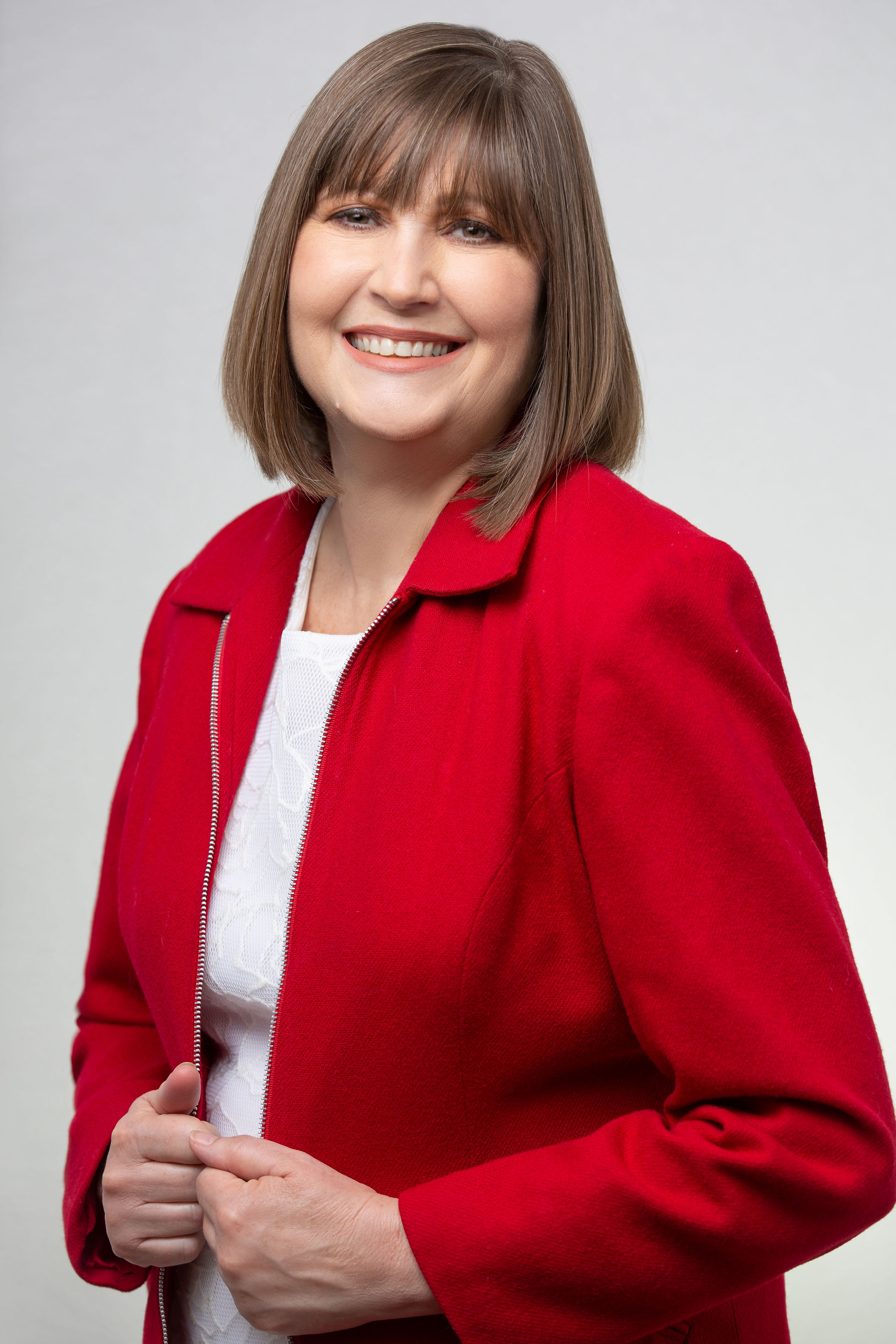 Lisa Nichols wearing red blazer