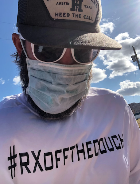 Photograph of a person with sunglasses, hat and a t shirt #rxoffthecouch