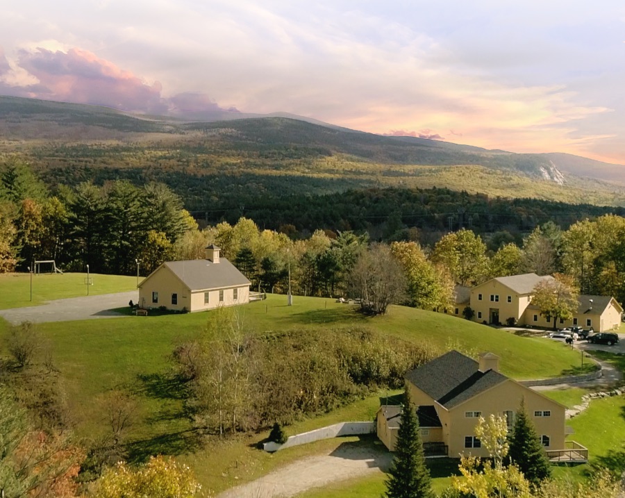 arial photo of Oliverian School Campus with rolling New Hampshire hills