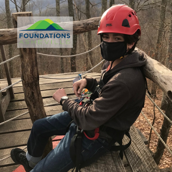 photograph of a Foundation Asheville client with a Foundations logo in upper left.